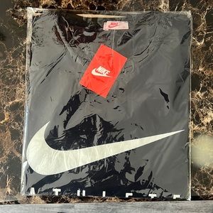 Navy Blue Nike Athlete T-shirt.